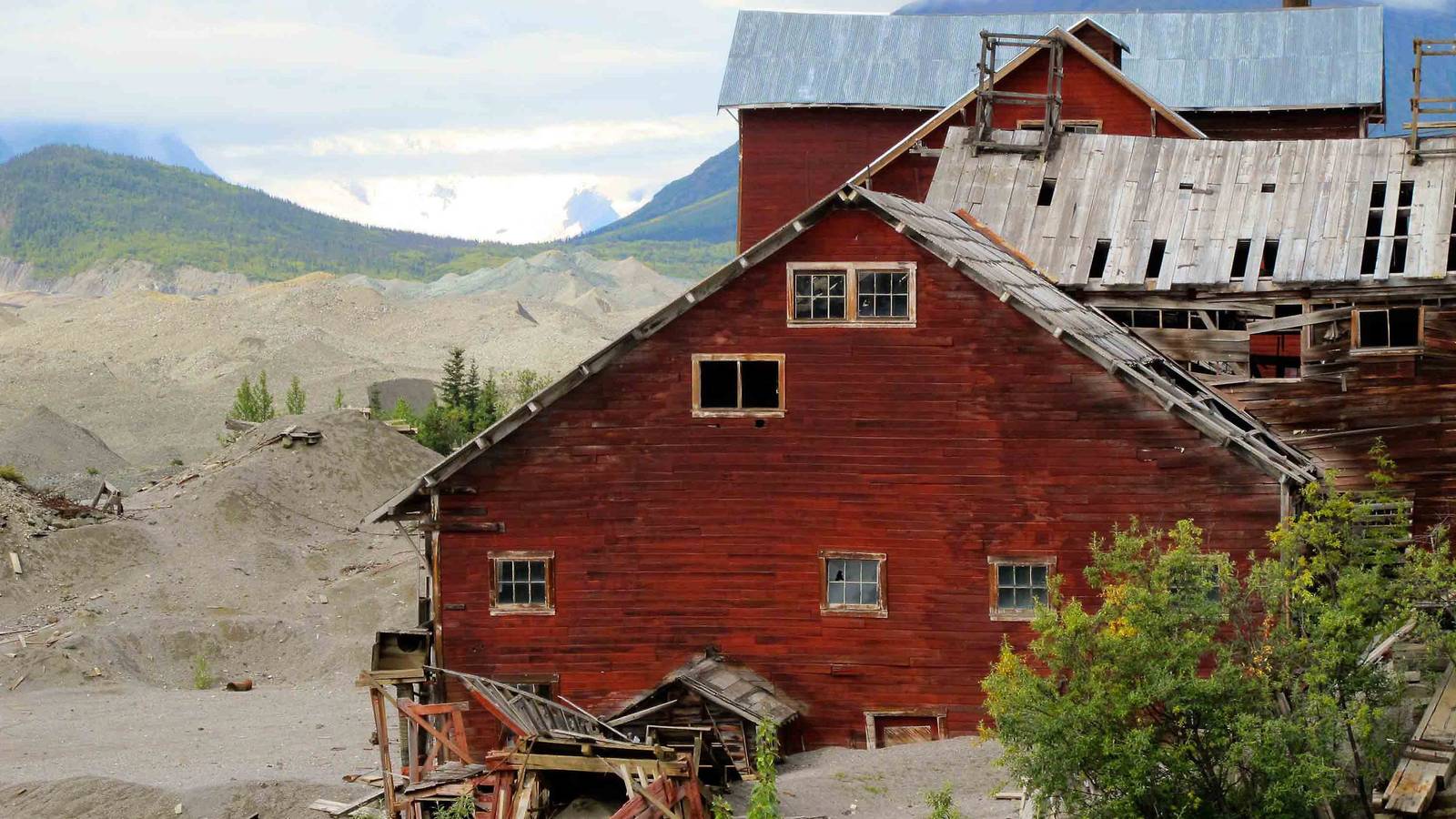 <p>Pictured above is the Kennecott Mine Mill Building at Wrangell-St. Elias National Park and Preserve in Alaska. After acquiring numerous Kennecott Mine historic structures, the Park Service decided to rehabilitate and adaptively use some for park purposes, stabilize others (like the Mill Building), and let others deteriorate naturally. </p>