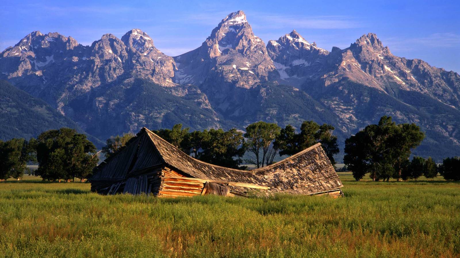 <p>This barn in Grand Teton might appear to be beyond hope, but with much of its original material still intact, skilled preservation carpenters could rehabilitate it to its original appearance.</p>