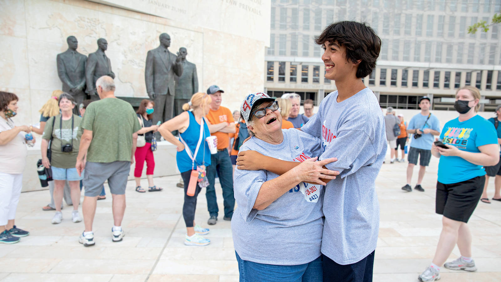 <p>Jennifer Baxter celebrates visiting her 423rd park (and securing the associated stamps) with her 15-year-old grandson, Cameron Emerson, at the Dwight D. Eisenhower Memorial in Washington, D.C. Over the years, Baxter has taken Cameron and his sister Rachel on many of her park adventures. </p>