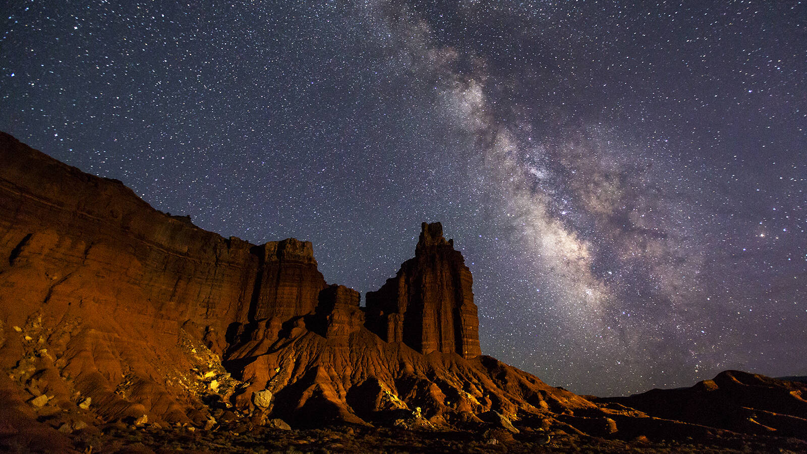 <p>When Frank finally managed to snap this photo at Capitol Reef National Park in Utah after an hour of trying, he and his wife, who was with him, had to laugh at the lucky break he got as he was about to give up: An approaching car’s headlights had illuminated the rock wall at just the right moment. “She was like, ‘Well, you couldn’t have planned that any better,’” he said.</p>