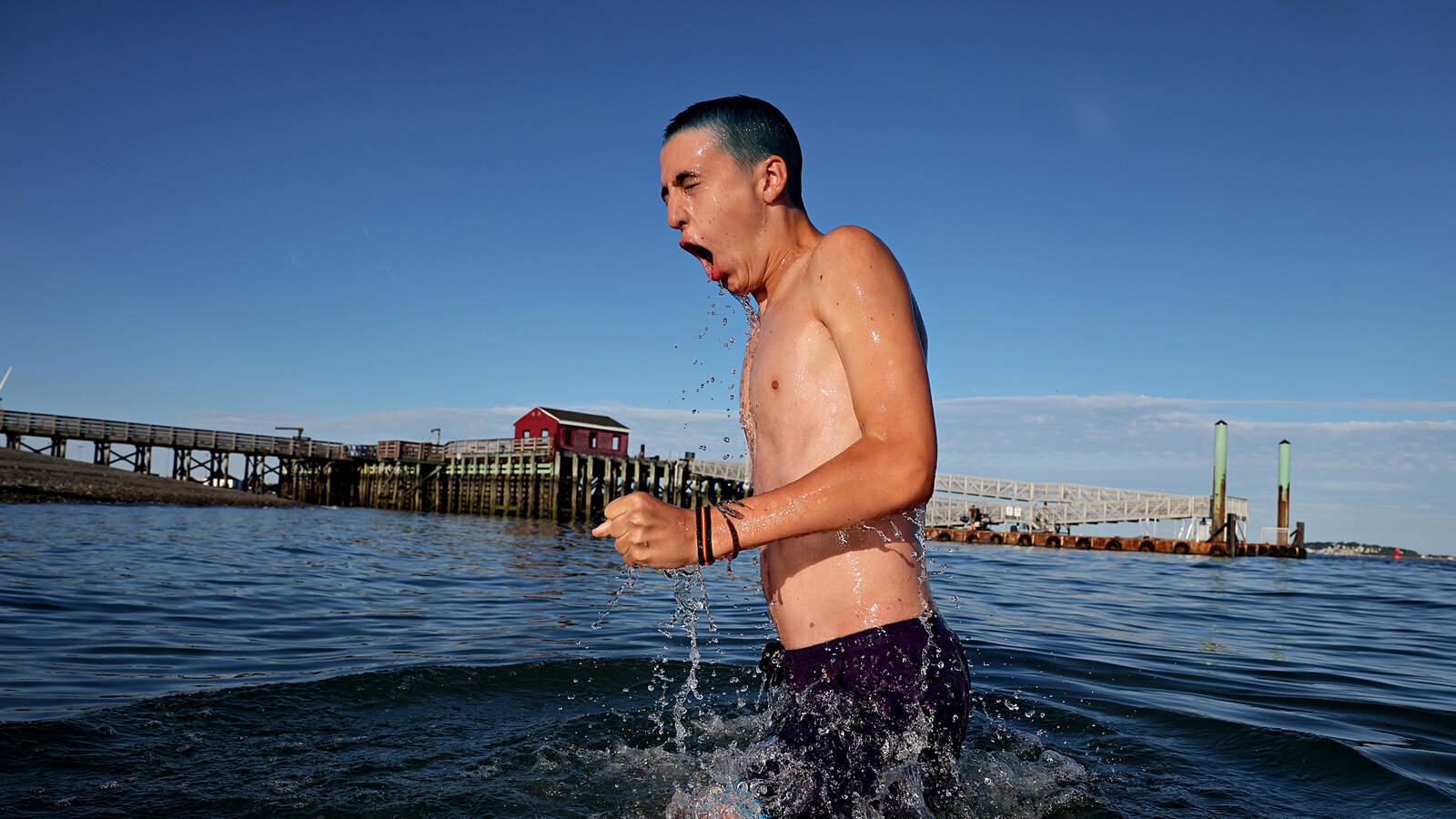 <p>Water-based activities from boating and fishing to swimming in the frigid bay (demonstrated by Lucas Hoffman) are a primary attraction for the thousands of visitors who flock to Boston Harbor Islands every year.</p>