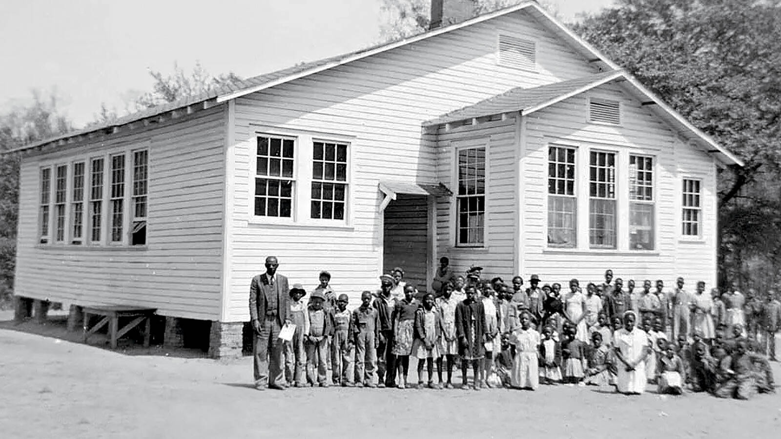 <p class="p1"><span class="s1">Students gather </span>in front of the Pee Dee Rosenwald Colored School (as it was then called) in South Carolina.</p>