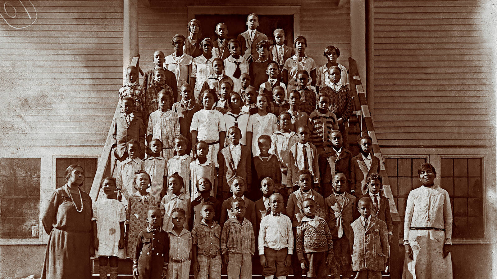 <p class="p1">Students pose in front of the Jefferson Jacob School in Prospect, Kentucky, circa 1920. Roughly one-third of all Black children in the South passed through Rosenwald classrooms during the time the schools were active. </p>