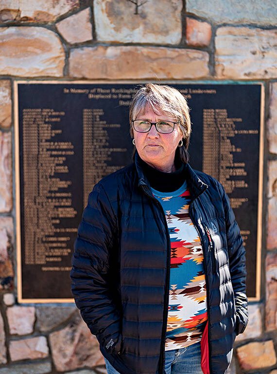 <p>Carrie Eheart, shown here at the Rockingham County memorial, only discovered her family’s mountain past a few years ago. Her grandmother Louise Wood Austin grew up in Sugar Hollow in Albemarle County. As a girl, she probably didn’t know how to read — or swim. In the one story she told, she was drowning in a swimming hole when a young man jumped in to save her. They fell in love. Her father let them marry, and Austin’s new husband, a writer, took her to Waynesboro, where he taught her to read and write and where she later sold shoes in a department store. She was a very proper woman who always wore dresses. And she never said a word to Eheart about Sugar Hollow. “I just wish I could ask her, ‘What did you do there besides practically drown your future husband?’” Eheart said.</p>