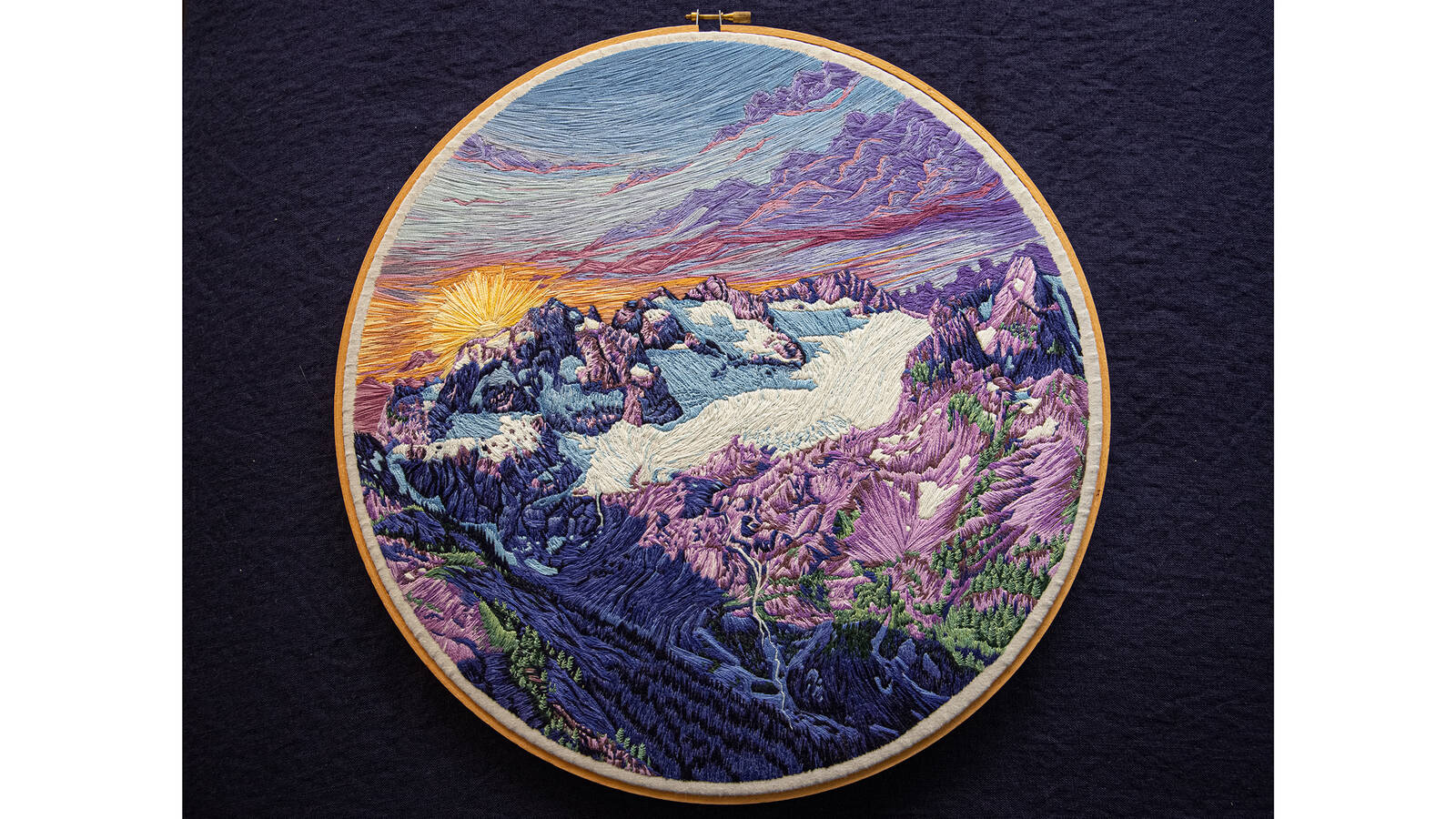 <p>Geri-Freki Glacier. Embroidery floss, bamboo hoop, repurposed cotton fabric.</p>