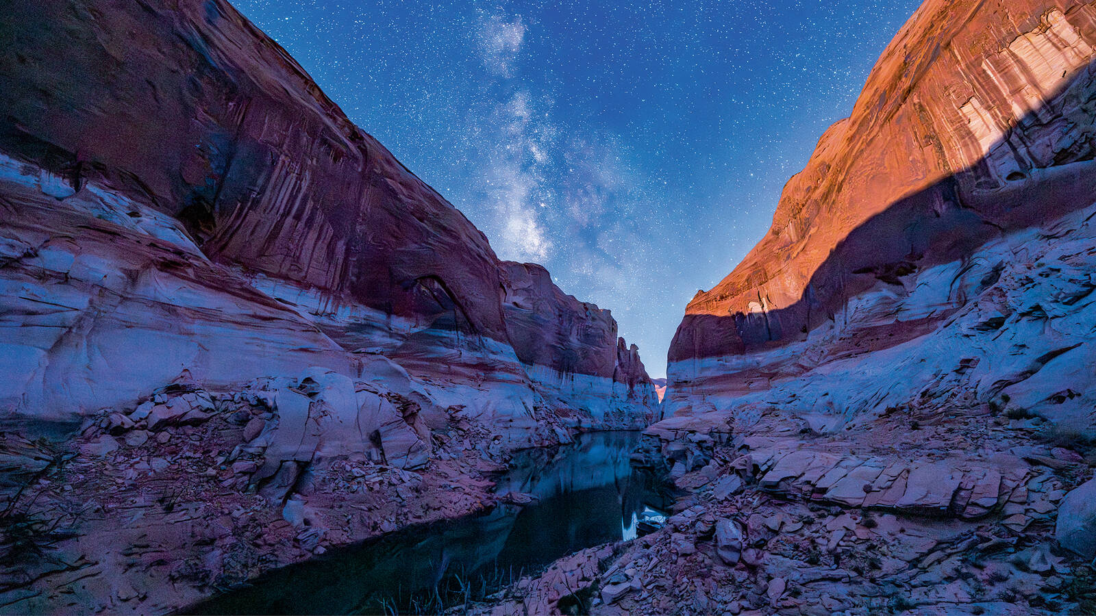 <p>The Milky Way over Lake Powell and its waterlines, or bathtub rings, reminders of wetter times. Recent studies have shown that evaporation from reservoirs removes 10% of the river’s flow.</p>