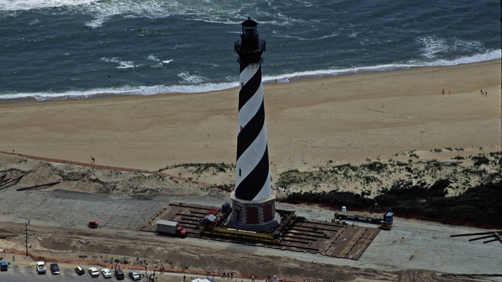 <p>The Cape Hatteras Lighthouse, pictured June 24, 1999, makes its slow progression on rollers and a rail system toward its new home further inland. The move took 23 days. </p>
<p> </p>