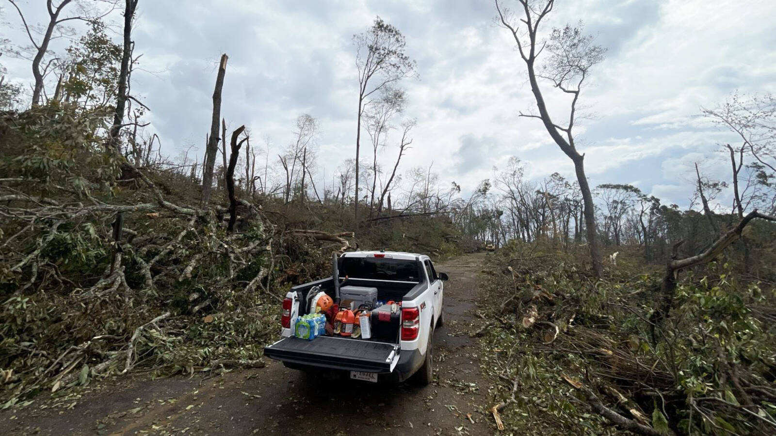 <p>A Blue Ridge Parkway crew begins cutting a path through the devastation caused by Hurricane Helene near milepost 375.</p>