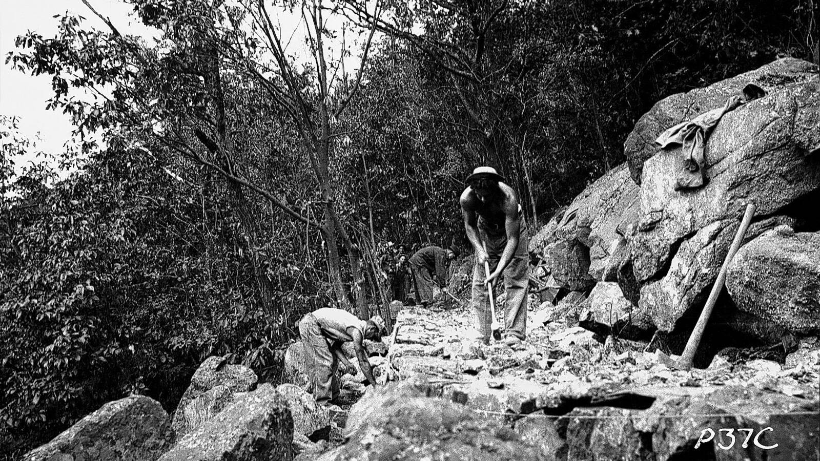 <p>Civilian Conservication Corps workers creating a hiking trail in Shenandoah National Park in the 1930s.</p>