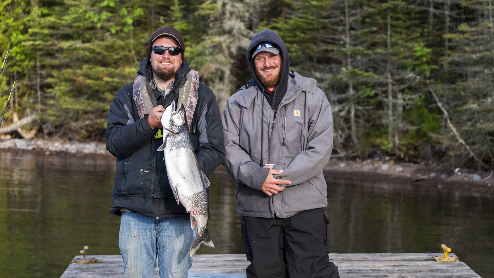 <p>The family had the good fortune to camp near Russ, on left, and Dave, on right, who followed through on their promise to return from a fishing expedition with enough lake trout for everyone.</p>