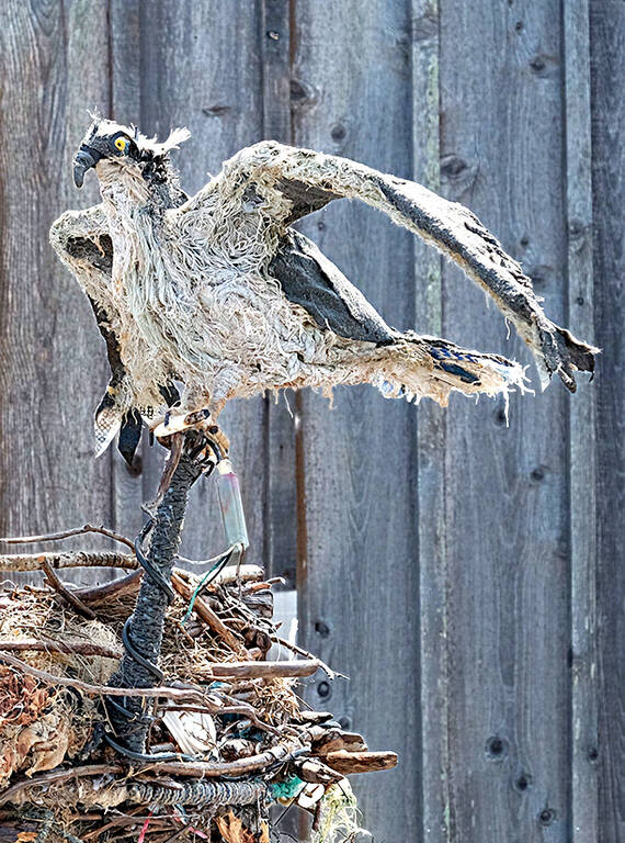 <p>An upcycled sculpture by Roe of an osprey atop a nest at Fire Island.</p>