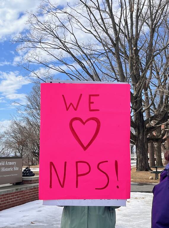 <p>A "We love NPS" sign during a rally at Springfield Armory National Historic Site in Massachusetts. </p>