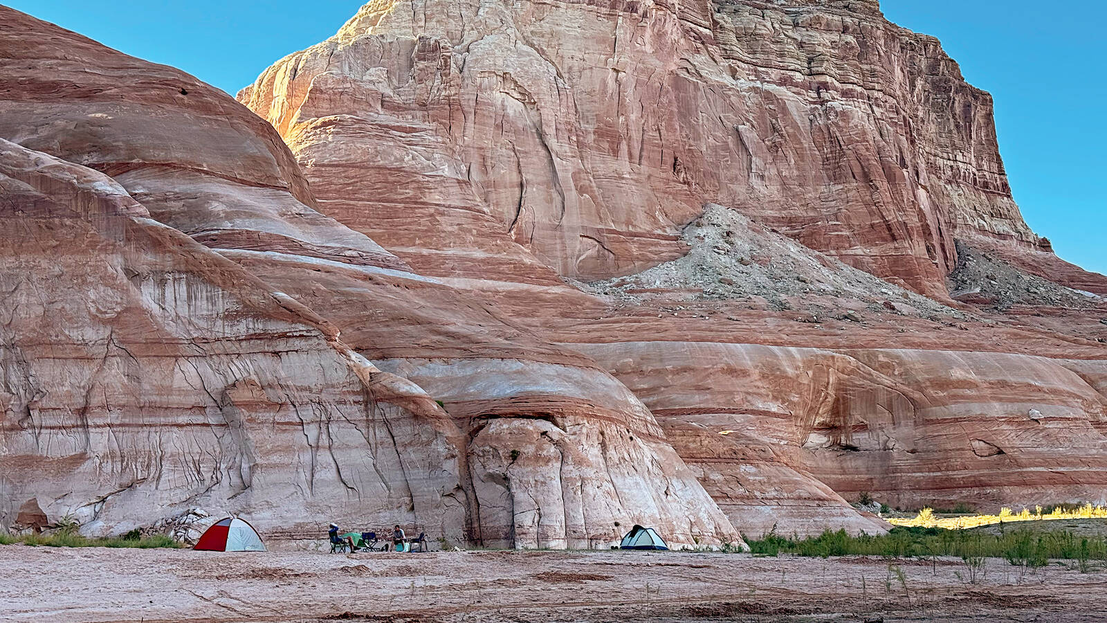 <p>The crew's camp in a large cove within Padre Bay. The accessibility of beaches and campsites throughout the park varies as the lake’s level fluctuates.</p>