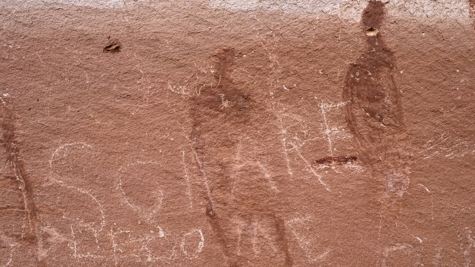 <p>Some graffiti overlays ancient petroglyphs. (Pictured: Canyonlands National Park.)</p>