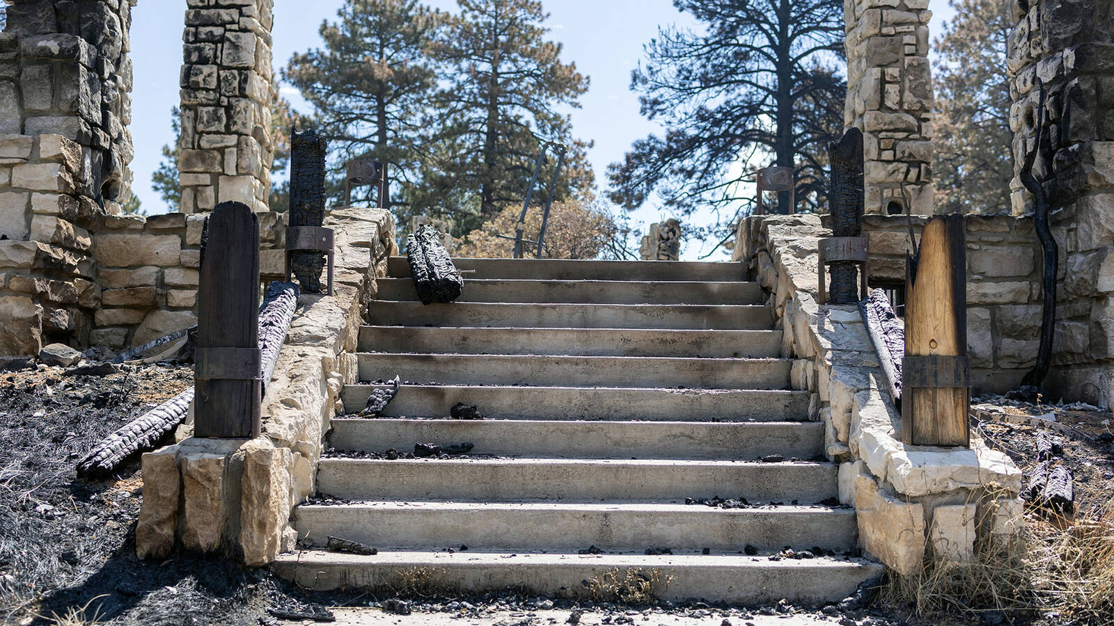 <p>Steps leading to the North Rim Visitor Center entrance at Grand Canyon National Park. The building was destroyed by the Dragon Bravo Fire July 12-13, 2025. </p>