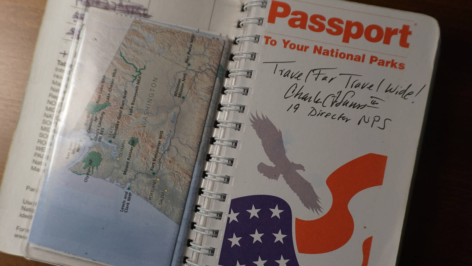 <p>The inside front cover of Kai Tran's passport with an autograph from former National Park Service director Chuck Sams, whom he met at a parks advocacy event in Washington, D.C., in 2024. </p>